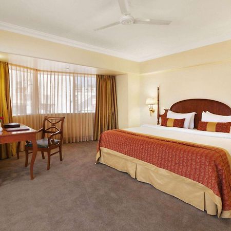 Ramada Plaza By Wyndham Palm Grove Hotel Мумбай Екстериор снимка