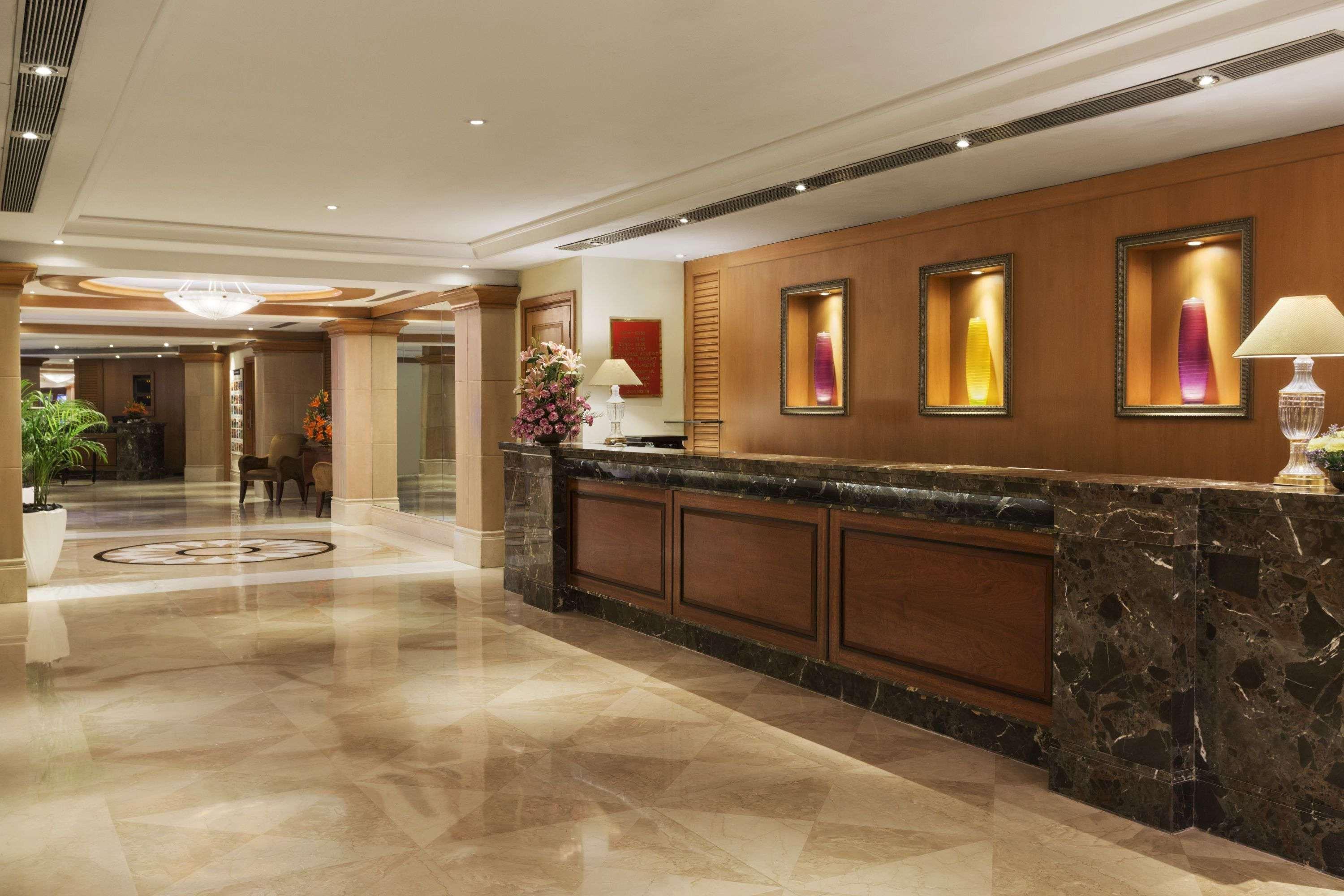 Ramada Plaza By Wyndham Palm Grove Hotel Мумбай Екстериор снимка The lobby of the hotel